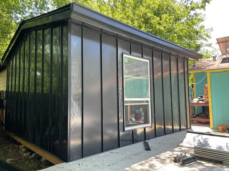 Black standing seam metal wall panels for Roof Inspection in North Tustin