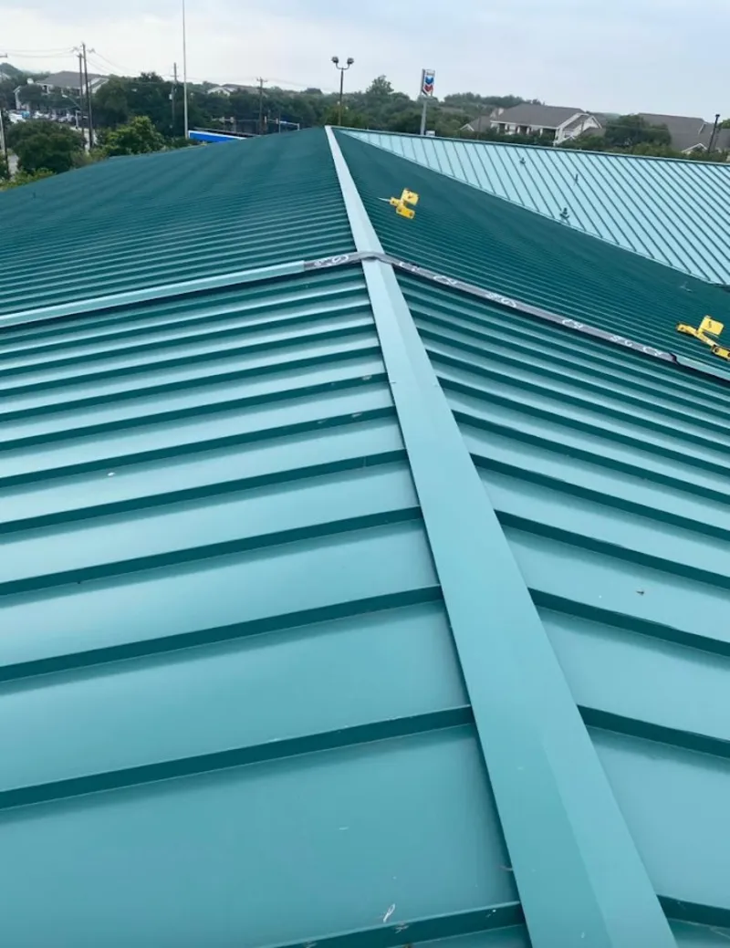 Green commercial metal roof ridge and valley for Metal Roof Repair in North Tustin